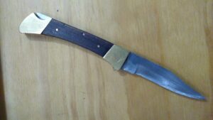 Vintage Folding Hunter Spine-Lock Knife with wood and brass handle [Used – Excellent Cond.] Under $10