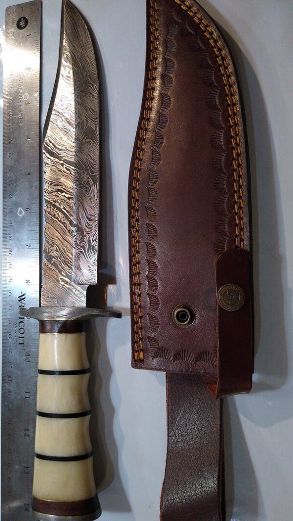 Handmade in TX, USA – Damascus 14″ Fixed Blade Bowie knife with Damascus guard and butt cap. New Leather Belt Sheath, with that new leather smell [New-Unused] Custom/Handmade