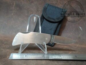 Zippo™ USA 2001 Stainless Steel Lock-Back Pocket Knife w/sheath - Etched 'Starcon International Inc.' on handle[Used-Pristine Cond.]